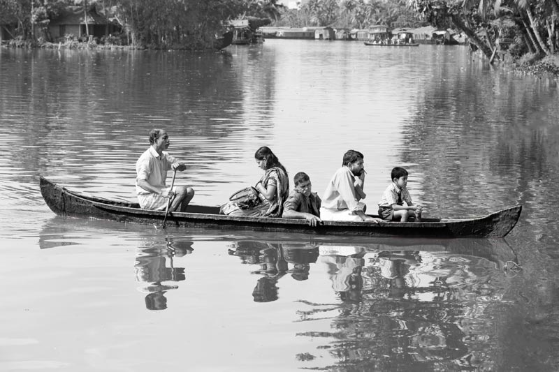 Living Below the Sea Level - Crossing from one bank of the river channel to another on a local boat in Alappuzha district, Kerala